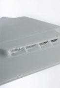 Close-up of a gray plastic vent cover with angled slats.