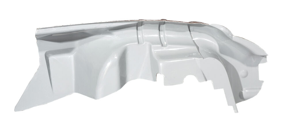 Close-up of a white plastic automotive interior panel.
