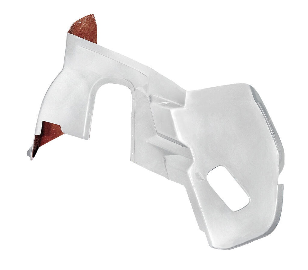 White and red plastic automotive interior trim piece.