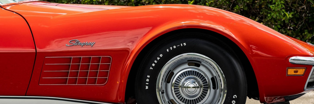 Close-up of red Corvette Stingray wheel