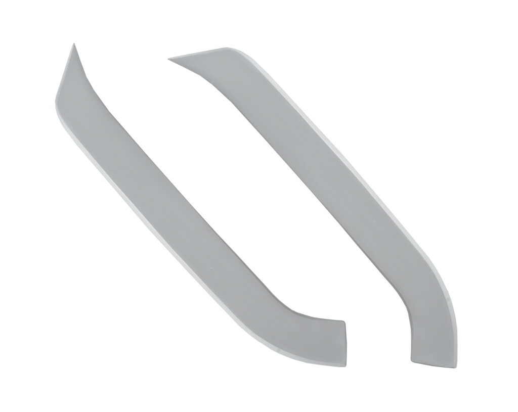 Two curved gray metal brackets on a white background.