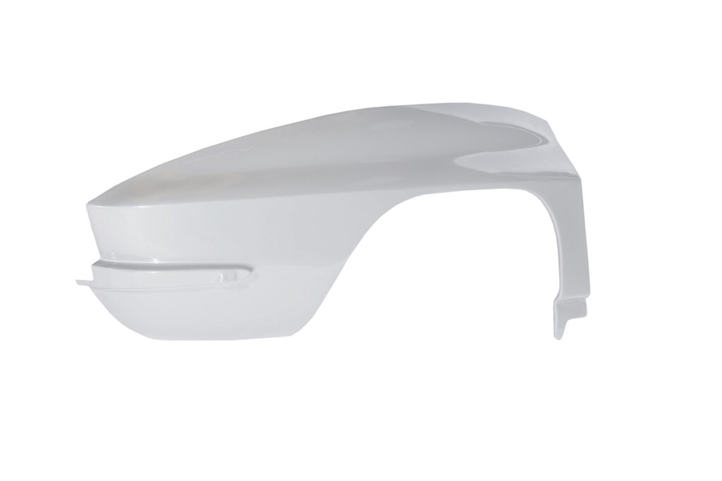 White car side mirror cover with sleek design.