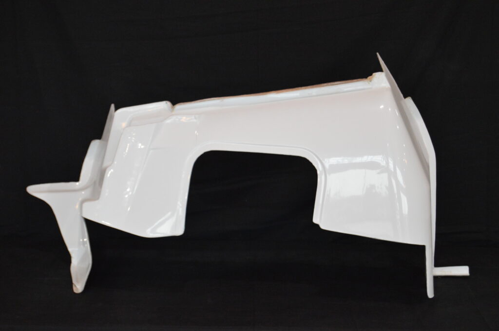 White car body panel on black background