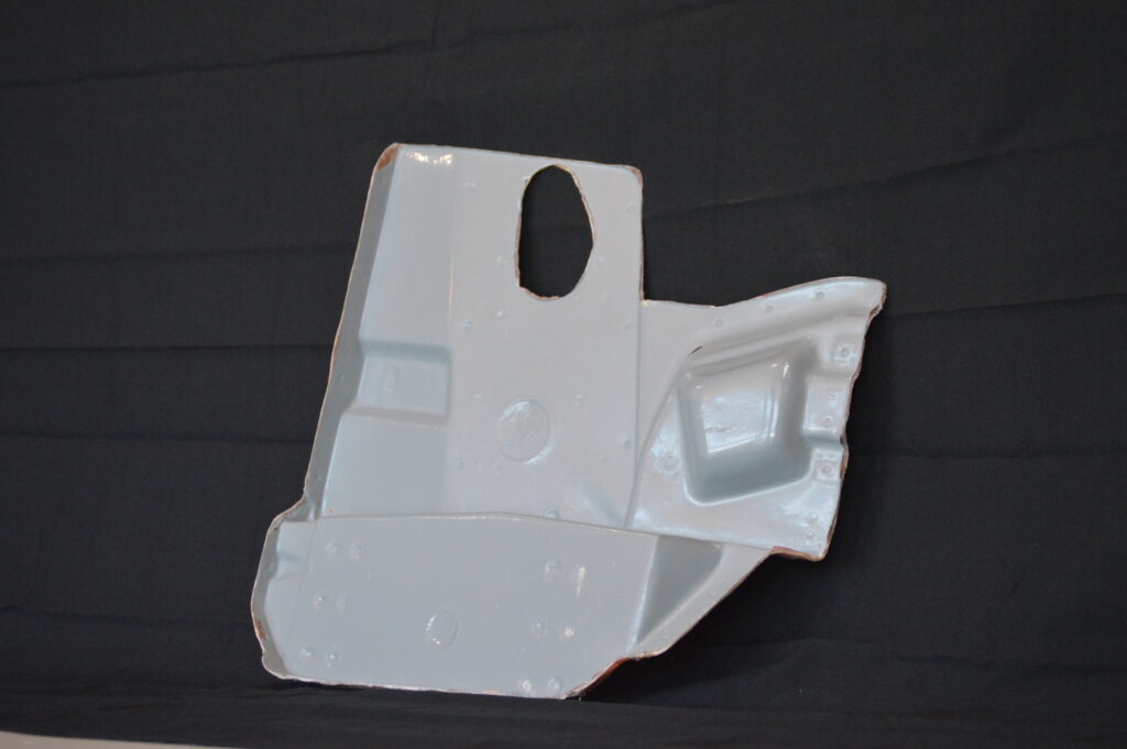 White molded bracket with oval hole