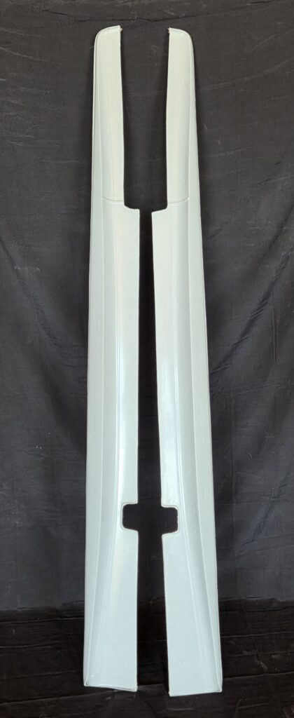White Corvette side skirt pair, vertical view