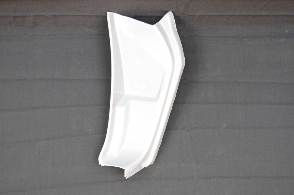 White styrofoam food tray on gray background