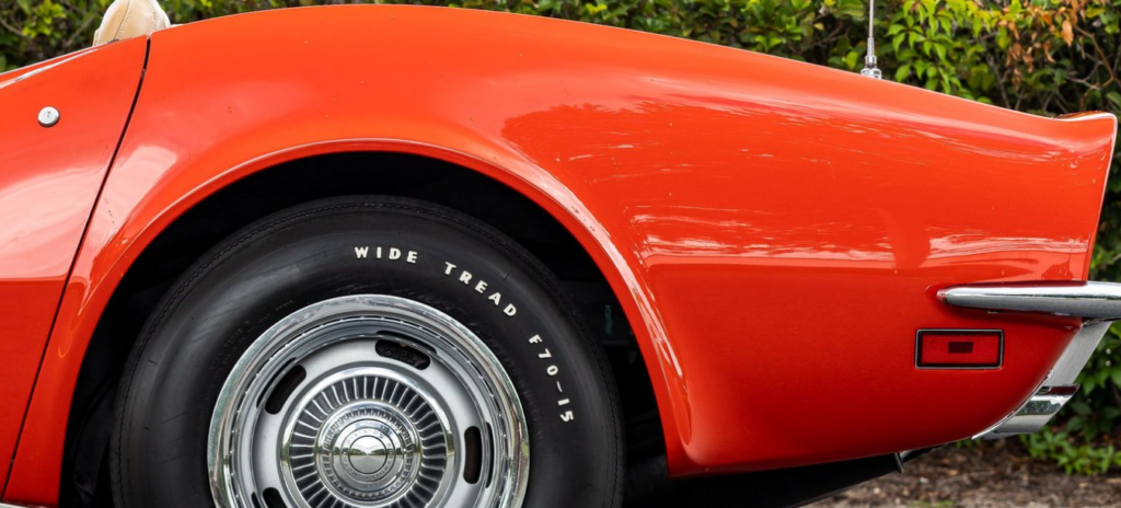 Red vintage car rear wheel and fender
